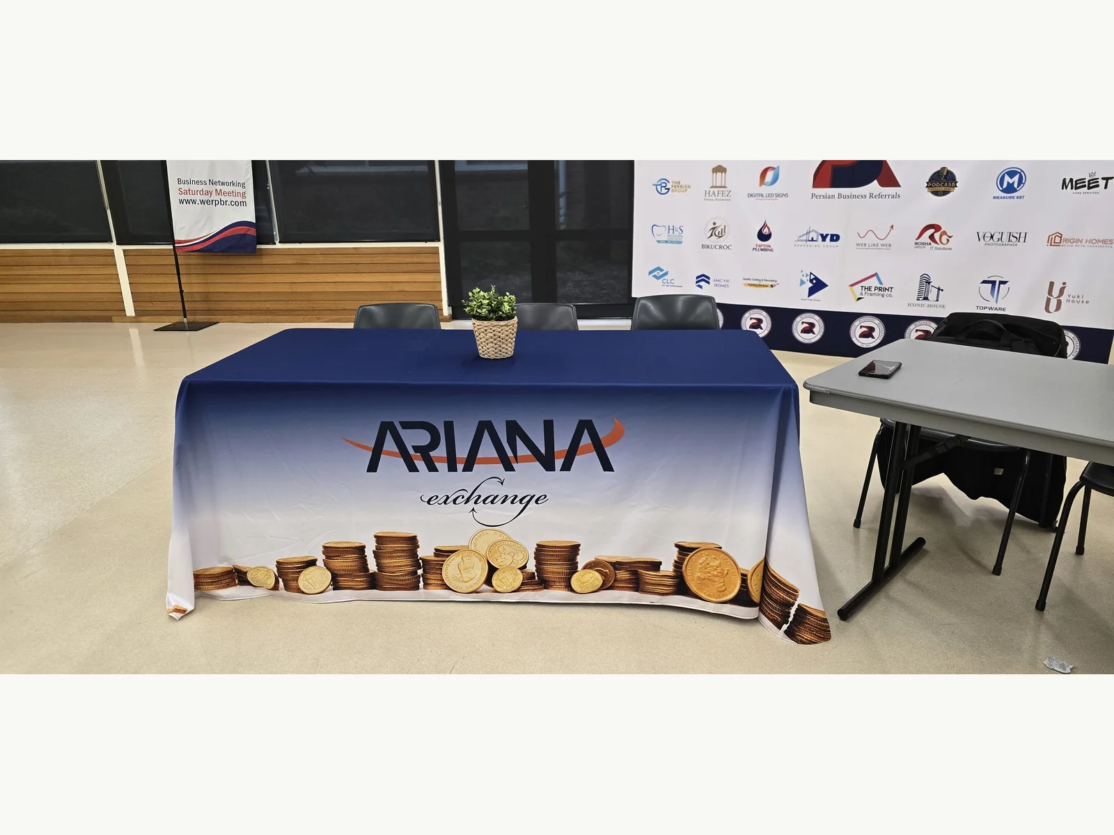 Branded table cover and media wall event display